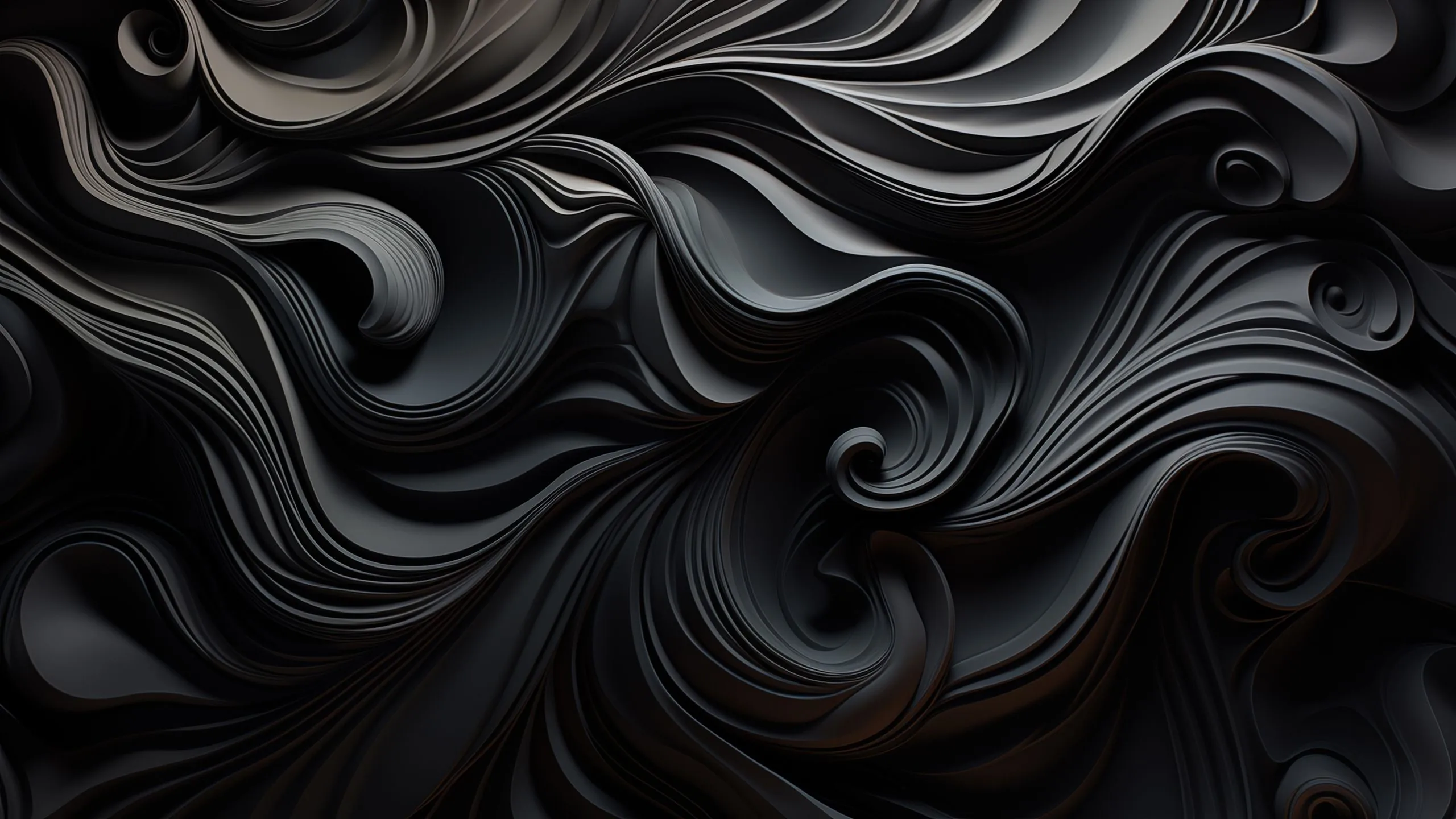 Deep spirals and curling ridges cut into a matte black surface, raking side light catching the ridge tops and leaving the grooves in shadow.