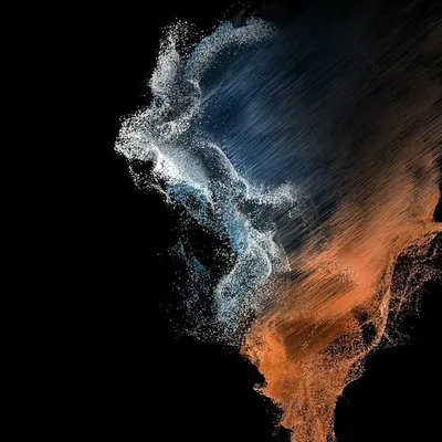 Pale blue spray collides with rust-orange sand down the right side of a black square, leaving the left third empty for app icons.