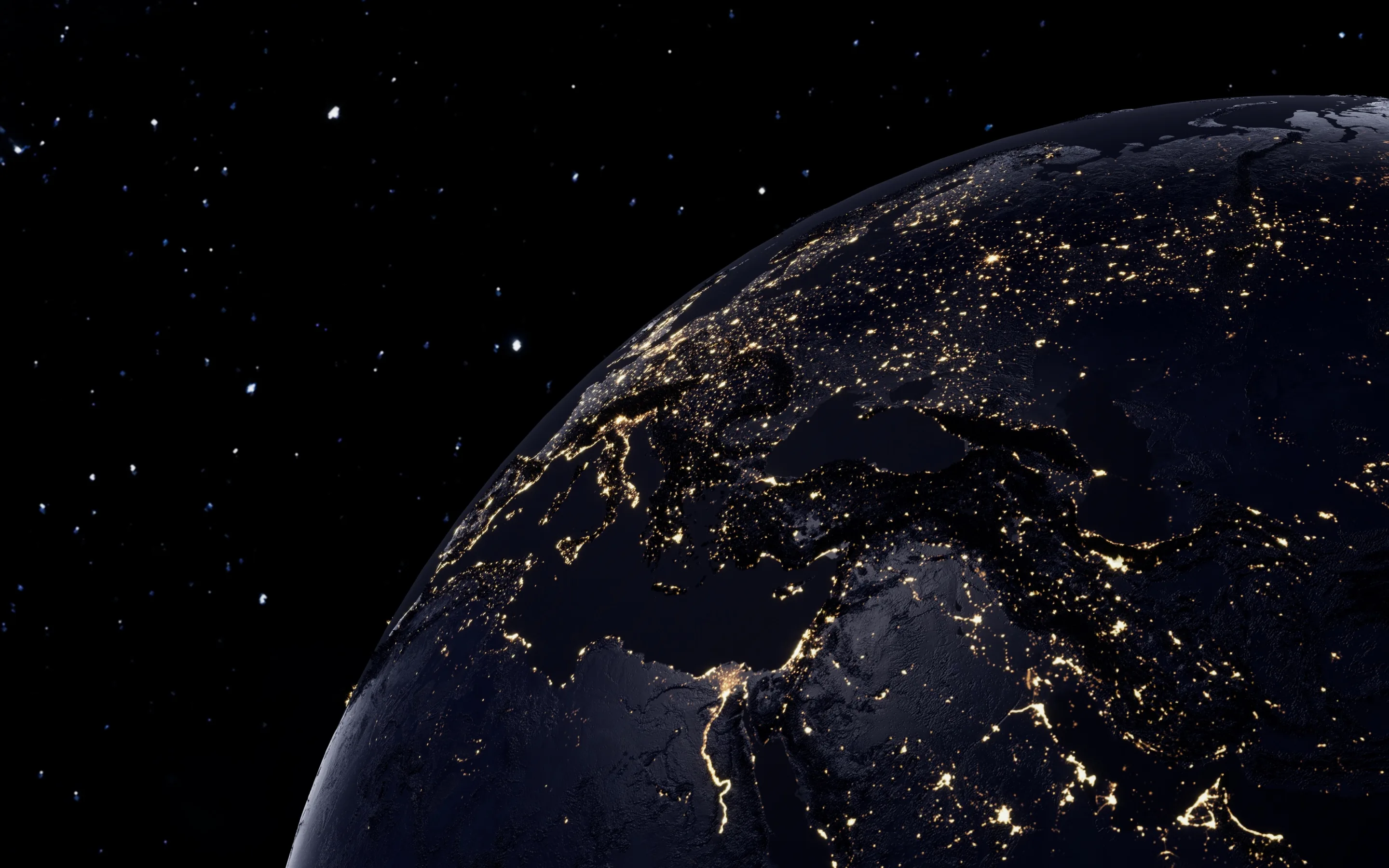 The darkened globe fills the lower right while Italy and the Mediterranean coast trace themselves in gold city lights, black space taking the upper left.