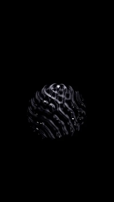 A small sphere covered in coiled ridges floats dead centre on pure black, lit from the upper left so the grooves throw their own shadows.