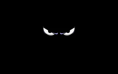 Two narrowed white eyes float on a black field, the shape of the face around them left entirely to the viewer.