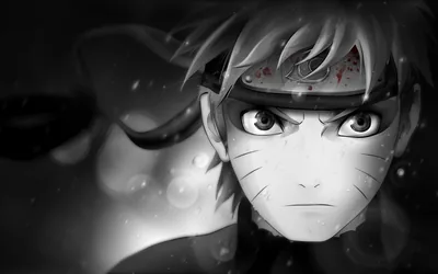 A tight monochrome close-up of Naruto in sage mode, whisker marks and shadowed eyelids sharp while everything around him blurs into grey haze.