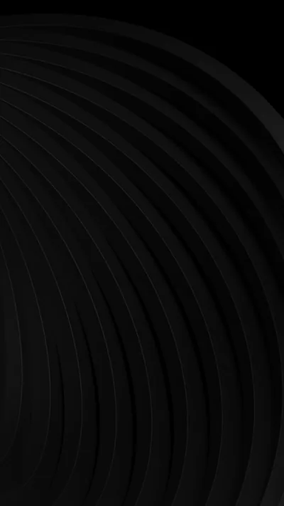 Wide concentric rings sweep out of the left edge in barely separated shades of black, leaving the right side of the tall frame completely empty.
