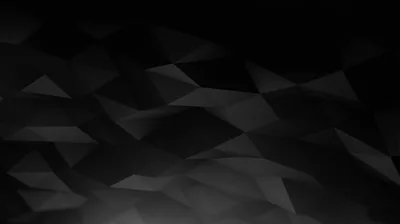 Faint triangular facets tile a near-black field, lightest along the lower left and dropping away to the corners.