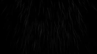 Thin pale streaks fall from the top of the frame like fine rain caught in a beam, thinning out before they reach the bottom edge.