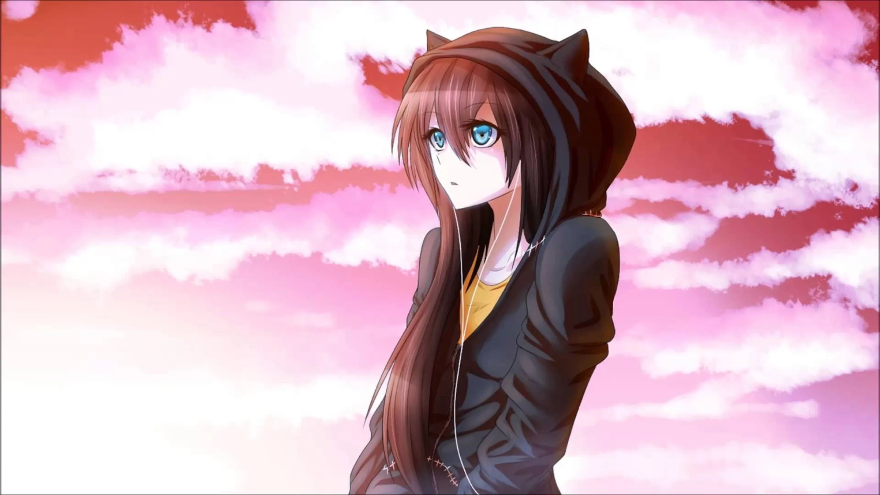 Long brown hair over a black hoodie with cat ears, pink and grey clouds banked up behind her at dusk.