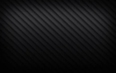 Soft diagonal bands run corner to corner in charcoal, brightest across the middle and sinking to true black at the edges.