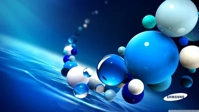 Glossy spheres in cobalt, glass and white drift in an arc above a rippling blue wave, the sharpest reflections on the two large balls right of centre.