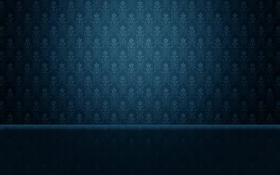 Small stamped motifs repeat across a deep navy wall lit from the top centre, a smooth darker band running along the bottom like panelling.