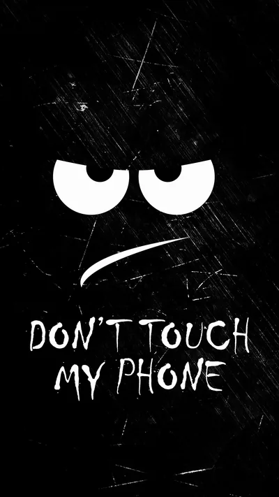 Two white eyes glare down over a frown on a scratched black lockscreen, the phrase set in bold caps below.