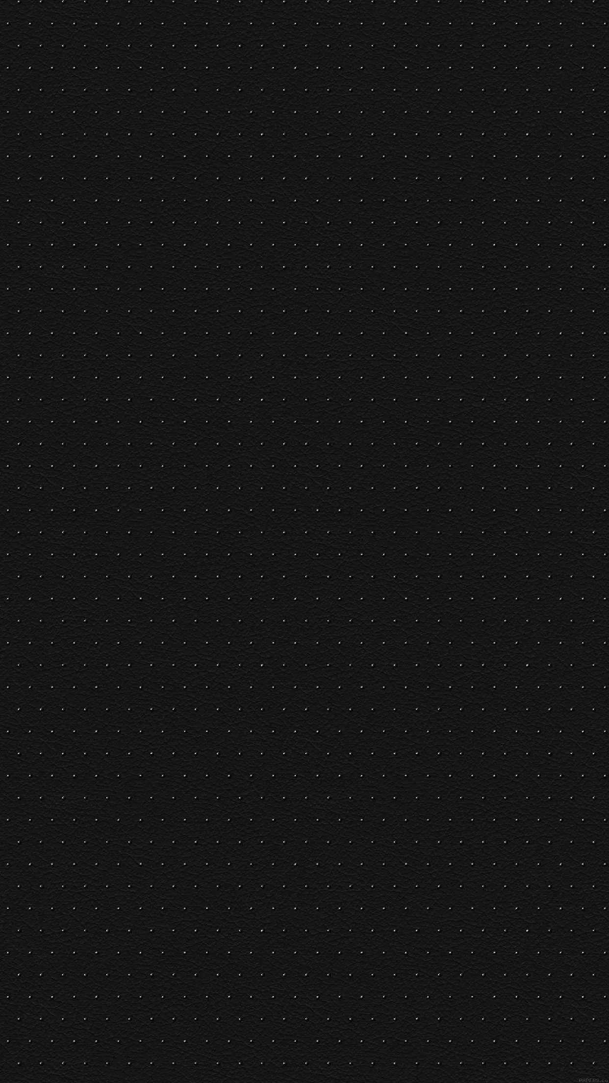 A tight hexagon pattern in near-black, subtle enough to read as plain until the light catches it.