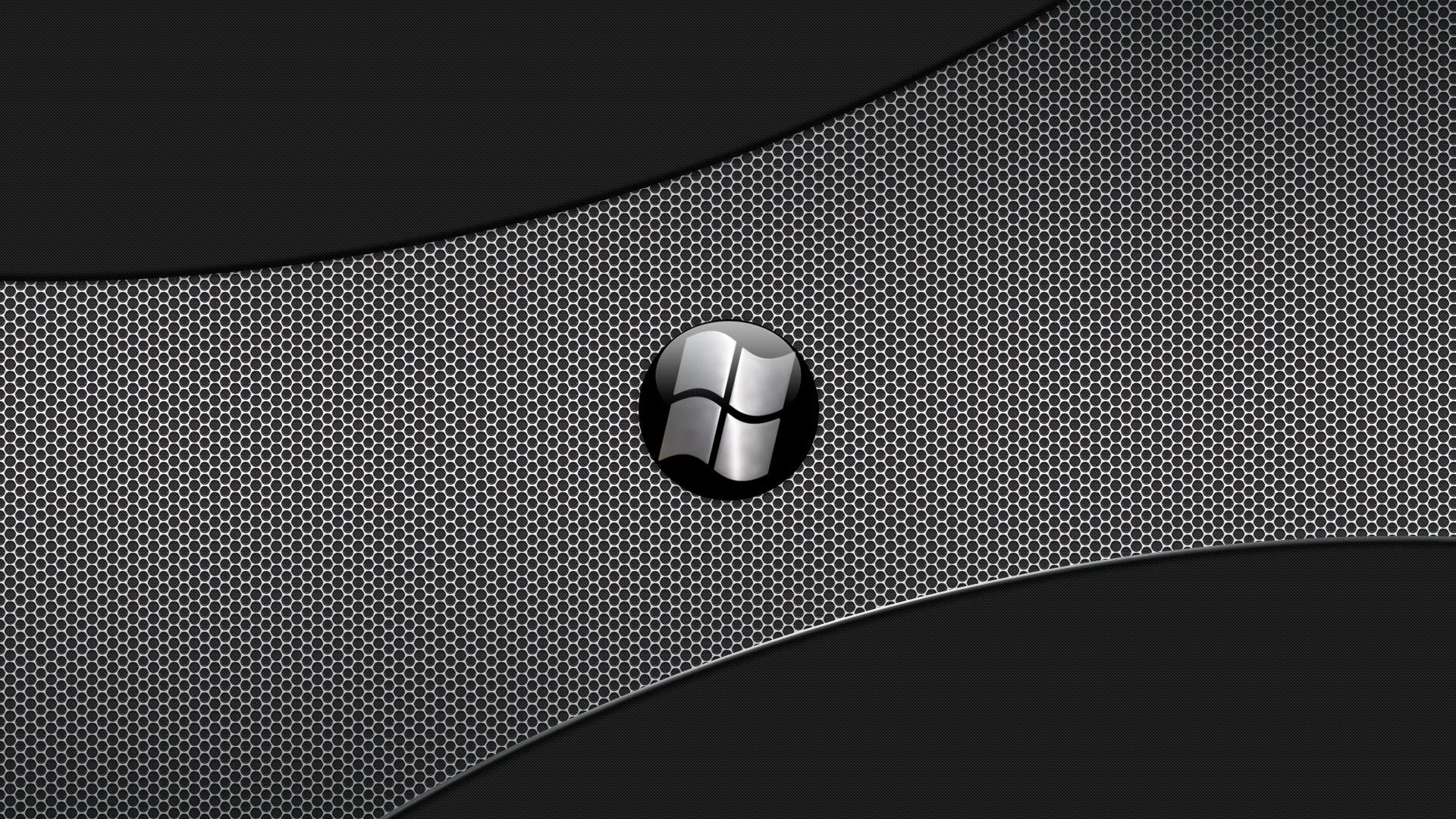 A polished Windows logo sits on a perforated metal panel, two dark curved bands sweeping behind it across the top and bottom.