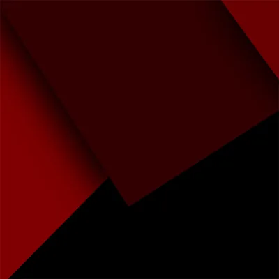 Large squares of dark red and black overlap at angles, each sheet catching a slightly different tone where its edge lifts.