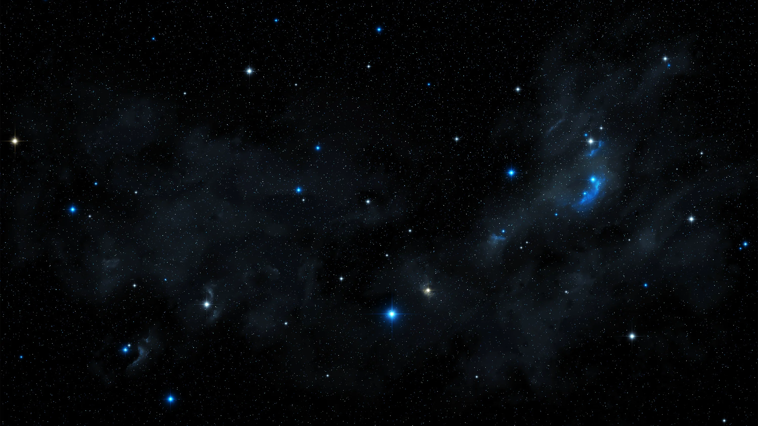 Cold blue stars scatter across black with soft dust glowing faintly around them, the brightest knot sitting just right of centre.
