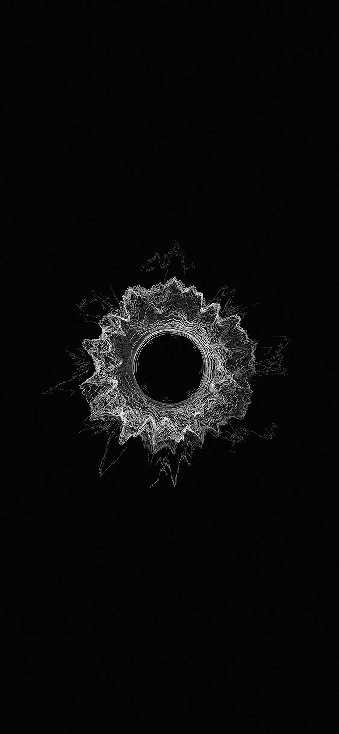 A cracked circular impact sits at the centre of a black frame, glass fractures spreading outward.
