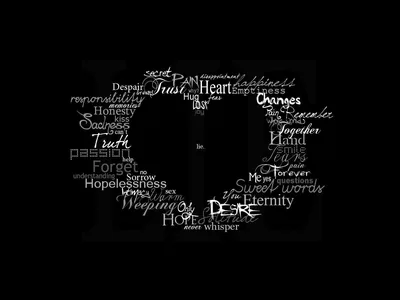 Words like trust, desire and eternity crowd together to form a heart outline in chalky white script, the centre left empty and black.