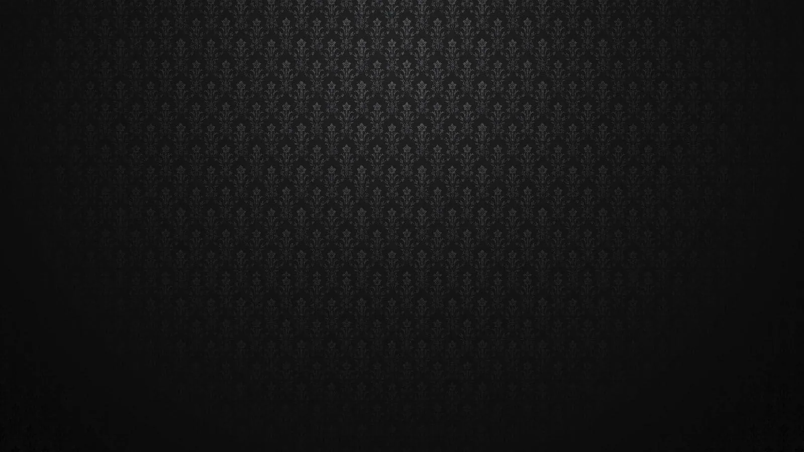 A small diamond motif tiles the upper half of the frame and dissolves into a soft black gradient below.