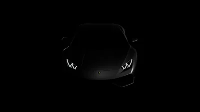Jagged white running lights and the faintest body outline are all that show of a supercar, the rest true black for OLED desktops.