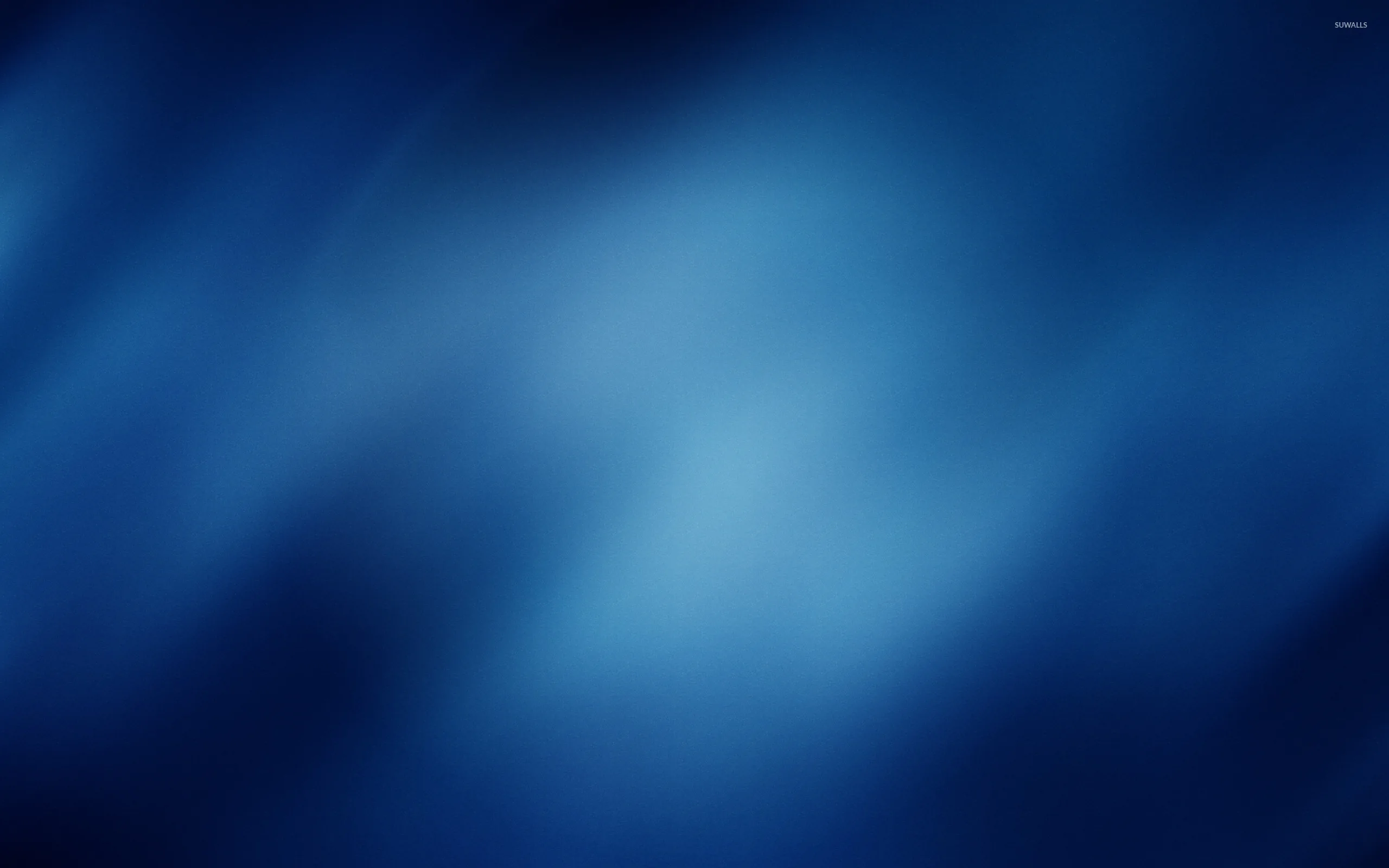 Soft diagonal streaks drift across a navy field like smoke behind glass, the corners darkening into a natural vignette.