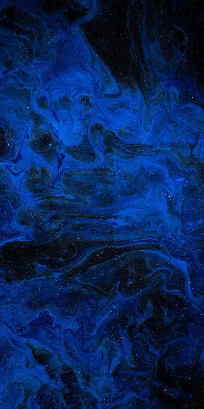 Navy and royal blue ink bloom through black in a tall marbled pattern, the paint splitting into fine threads near the bottom.