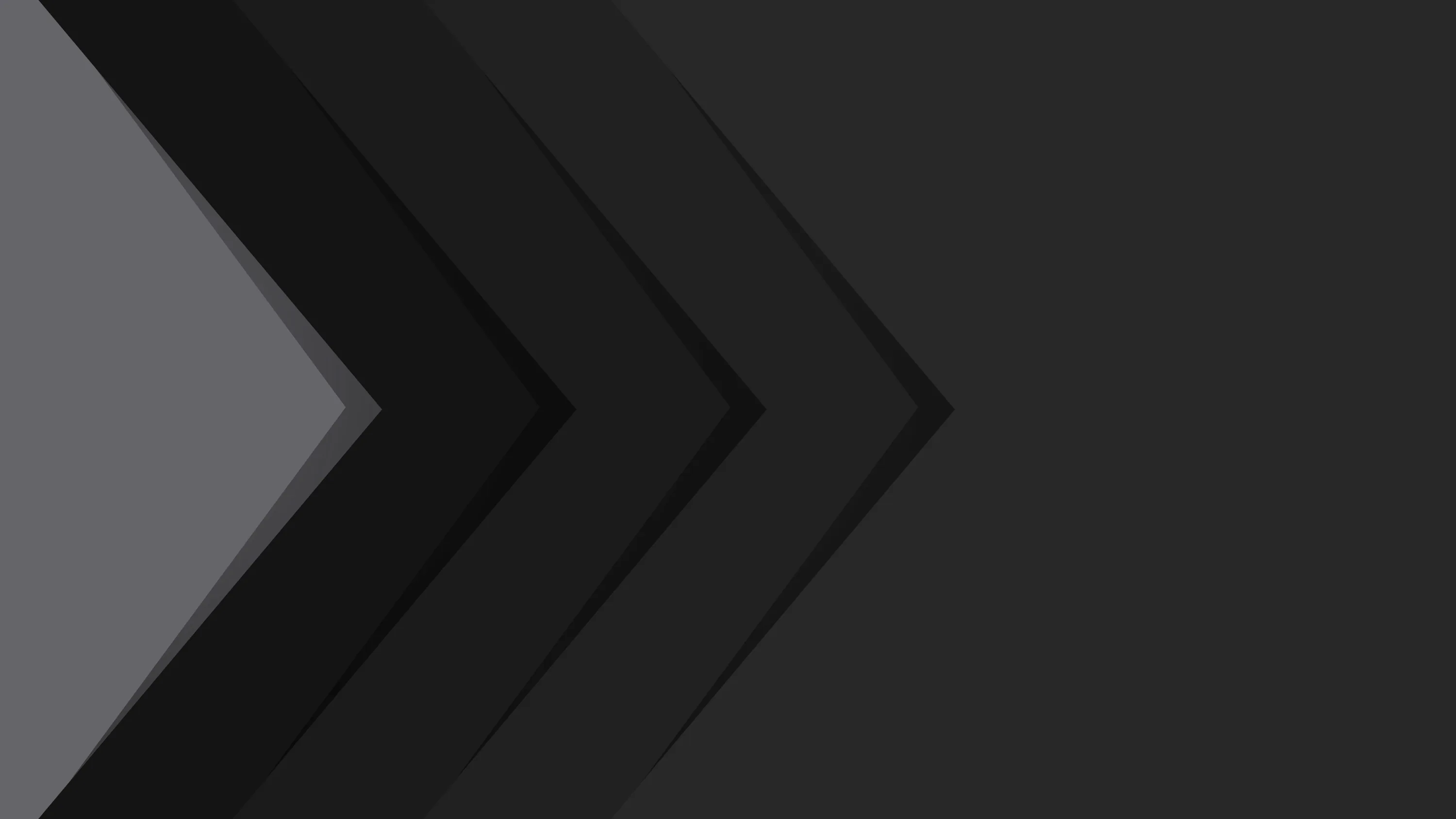 Stacked chevrons step from mid grey on the left through progressively darker tones, the right half left flat and clear.