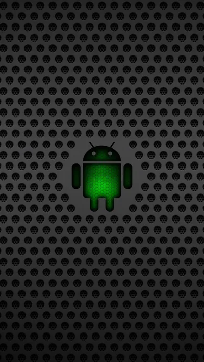The green Android robot stands small at the centre of a dark perforated steel sheet, the holes rendered in relief and dimming toward the frame.