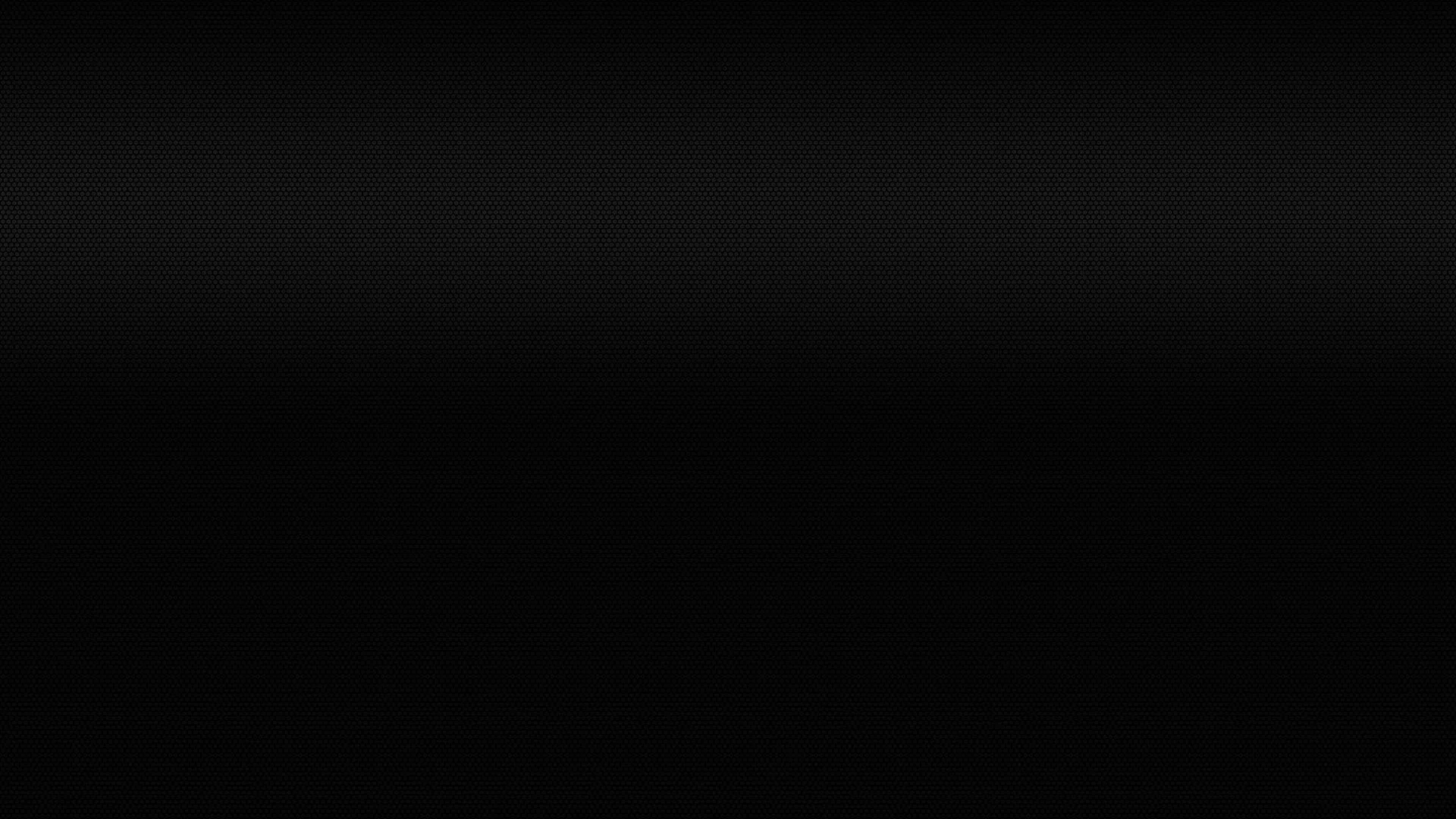 A thin strip of grey haze spreads across the upper third and fades out, leaving the rest of the frame flat unbroken black.
