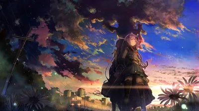 Shot from below, a long-haired girl stands on a path against banked orange and blue clouds, sunflowers and rooftops crowding the bottom edge.