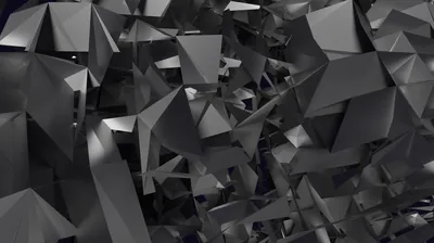 Sharp grey shards break apart in three dimensions, some panels catching light while others stay in shadow.