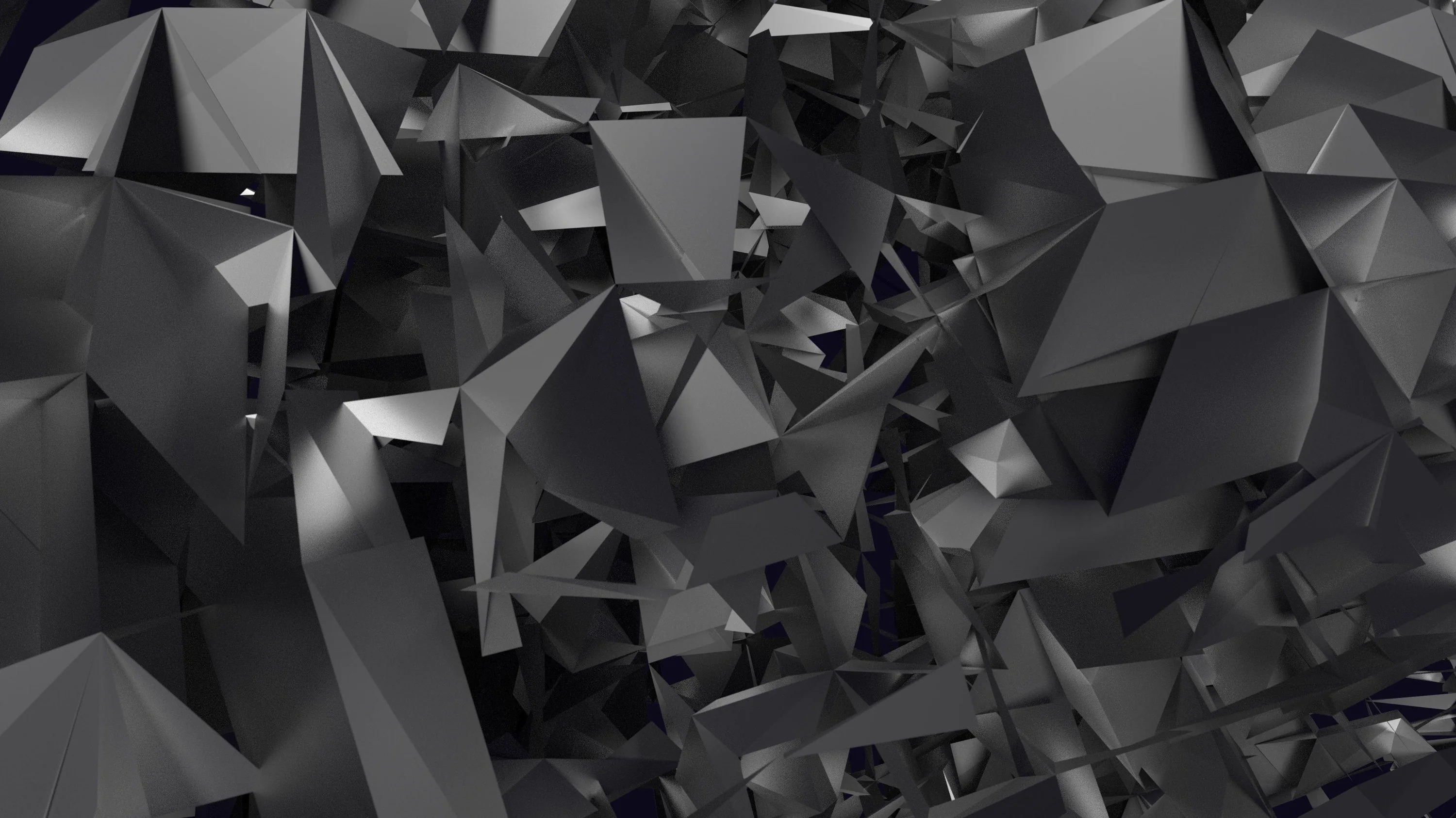 Sharp grey shards break apart in three dimensions, some panels catching light while others stay in shadow.