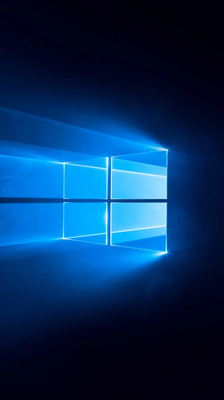 The window mark glows blue with sharp rays of light streaking out behind it across a deep blue field.