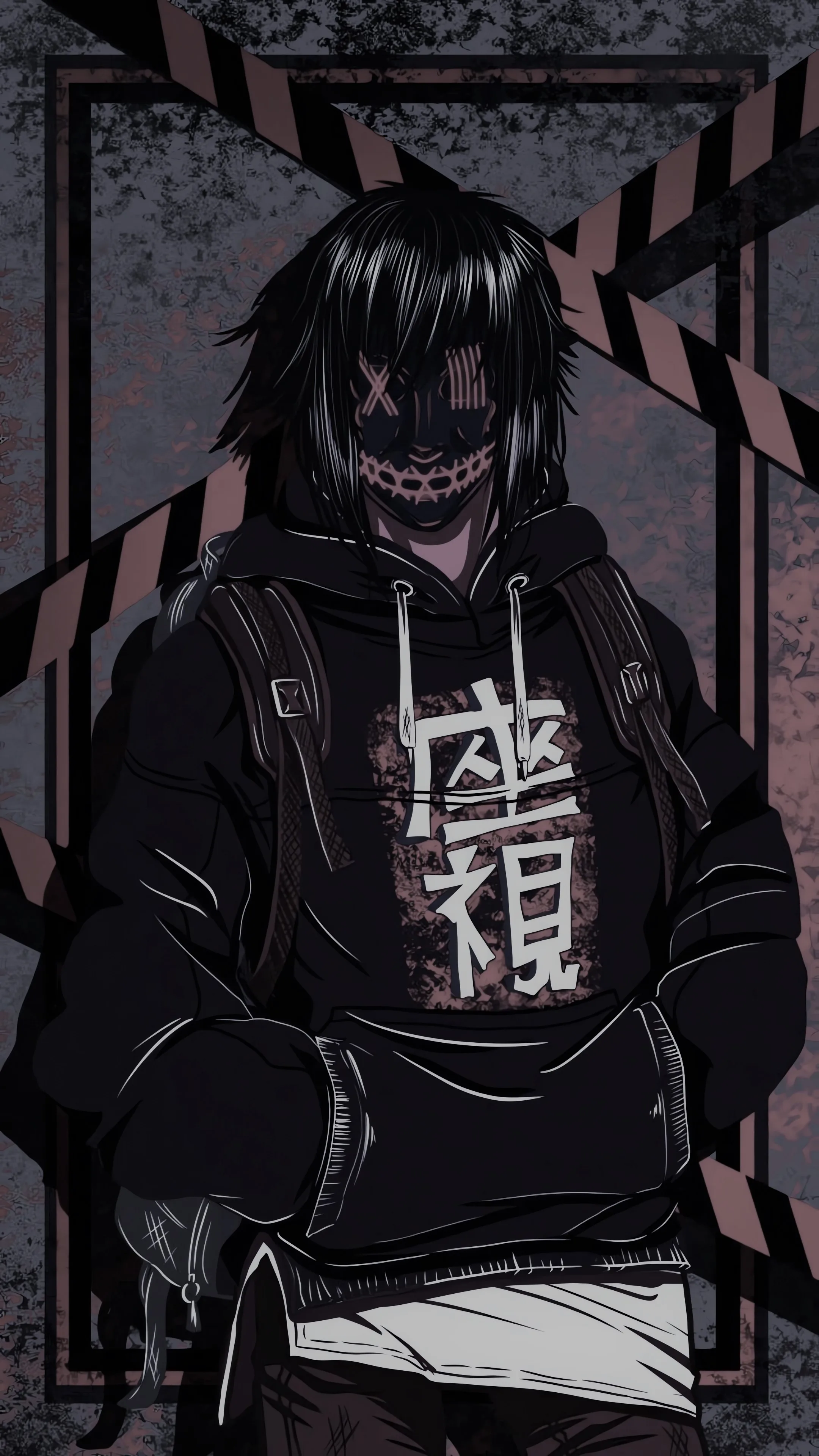 A boy in a black hoodie and a grinning teeth mask stands hands in pockets, yellow hazard stripes crossing the grey wall behind him.