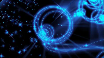 Rings of blue light spin off sparks and star flares in the upper corners, thin rays fanning down so the bottom edge stays darkest.