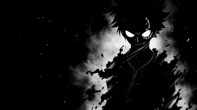 Spiked hair and one glowing eye at the top of the frame, the body below breaking apart into black smoke and floating specks.
