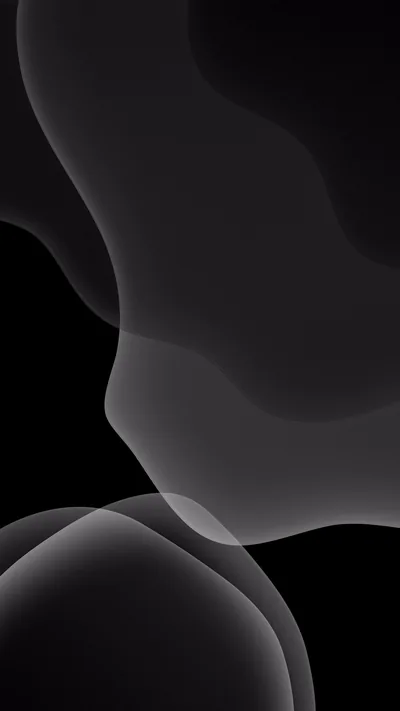 Soft grey shapes overlap in translucent layers across black, thinning near the top so the upper strip stays clear for icons.