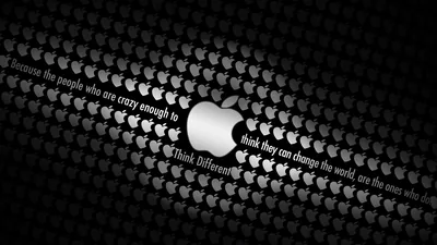 The silver Apple mark sits centred on a black field tiled with small logos and the Think Different lines running across it.