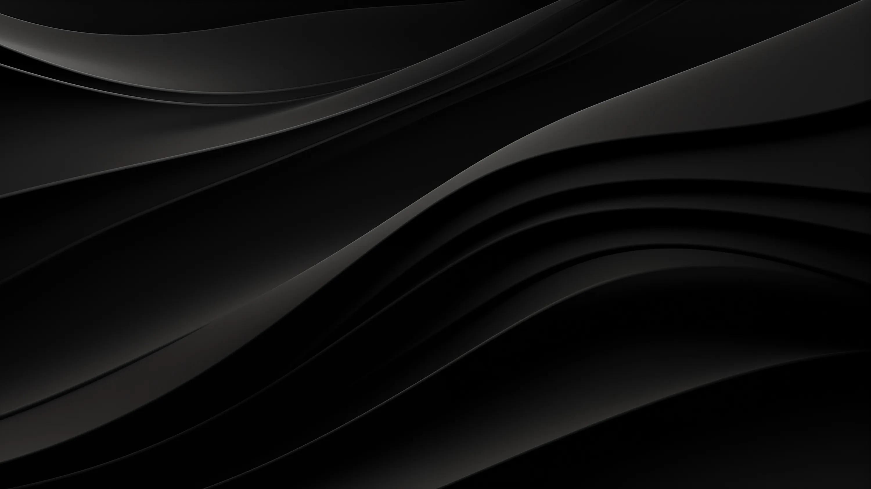 Broad wave shapes overlap across the frame in charcoal and black, edges softened so the layers read more as folds of cloth than lines.