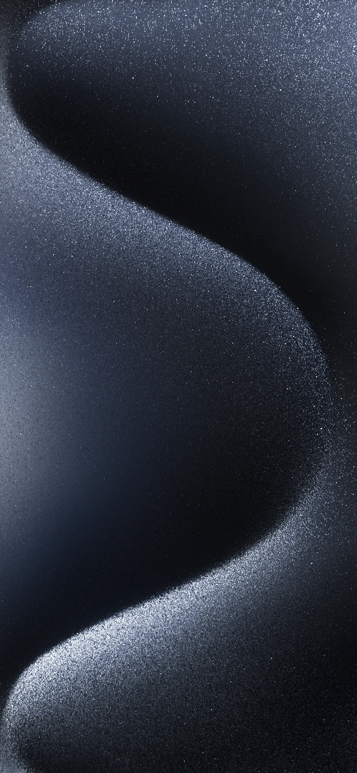 Soft grainy waves in dark blue titanium fold across the frame, the grain heavy enough to read as brushed metal under a low light.