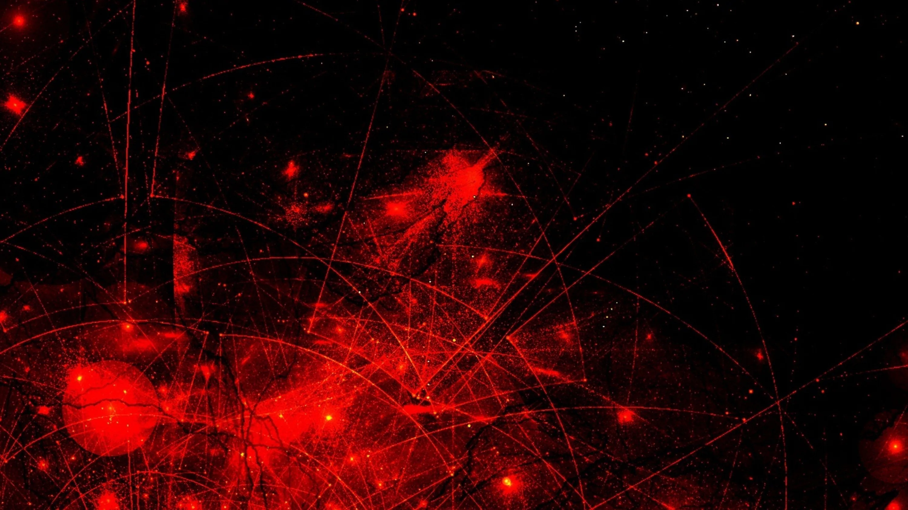Scattered red glows sit behind a web of hairline light trails on black, the density thickening toward the bottom left.