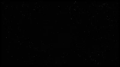 Small white stars scatter thinly across a black sky with no moon, horizon or cloud anywhere in the frame.