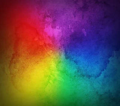 Watercolour pigment in every rainbow hue radiates from the centre over a mottled grunge texture, the edges soaking into black like ink on wet stone.