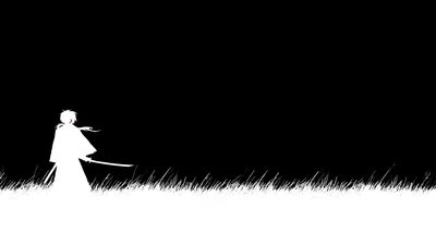 A white cut-out of a swordsman walks left through a fringe of grass along the bottom, the rest of the frame solid black and empty.