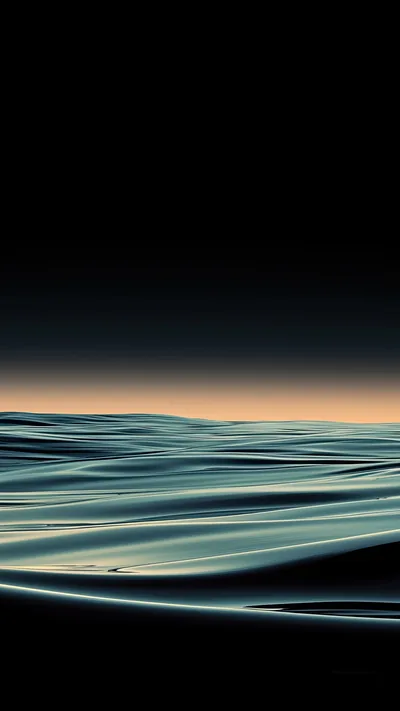 Long low swells catch the last teal light of dusk under a black sky — quiet, almost flat water.