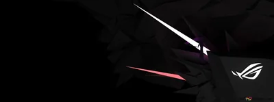 The ROG eye glows at the right of an ultrawide black panel while red and white streaks cut across the faceted surface behind it.
