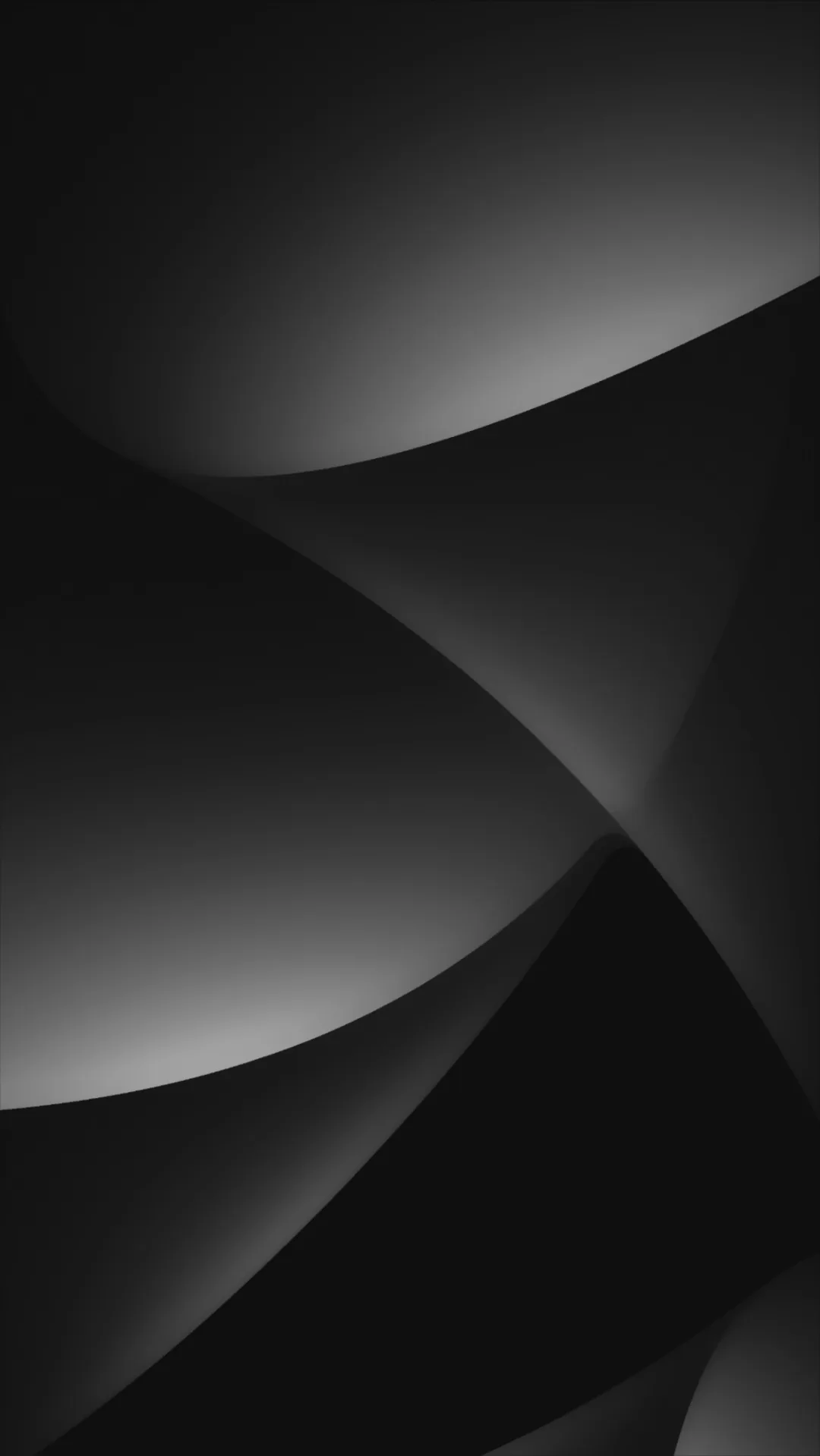 Broad black curves sweep across the frame, each edge caught by a dim grey sheen from the left, the right side kept deepest in shadow.
