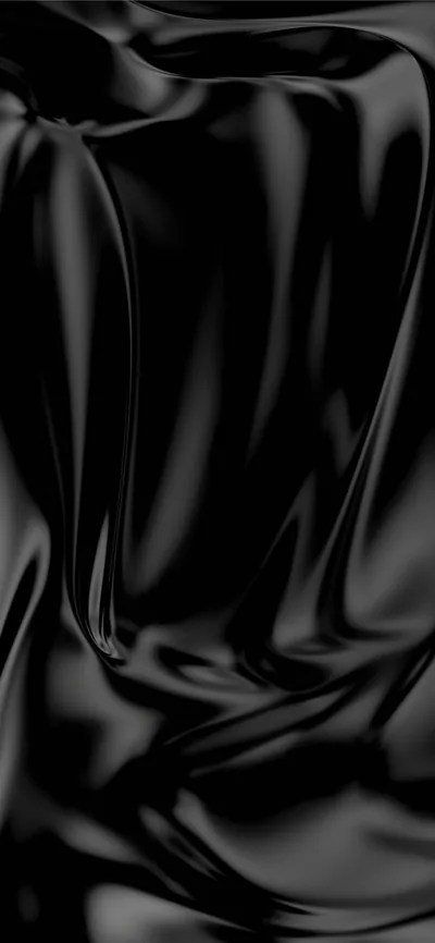 Heavy black silk pushed into soft creases, the light skimming across so the folds read as shape rather than colour.