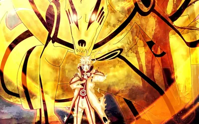 A figure stands wrapped in a burning gold chakra shroud, the fox's ears and swirling seal patterns rising above him in molten yellow.