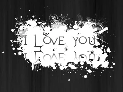 The words I love you sit inside a rough white paint splash with swirling flourishes, layered over a dark vertical wood grain background.