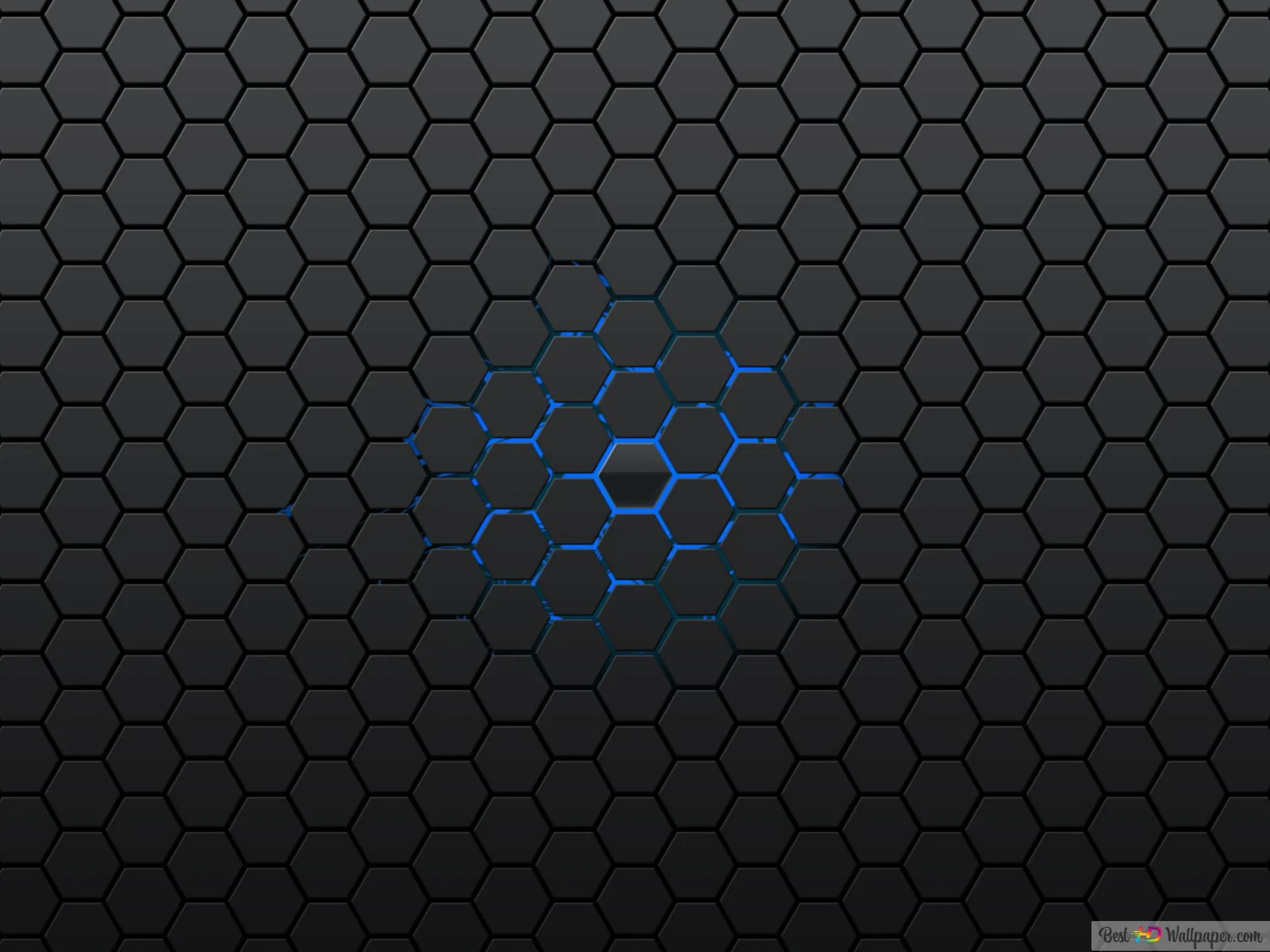 A dark hexagon grid covers the whole frame, one cluster near the centre lit from underneath in blue while the rest stays grey.