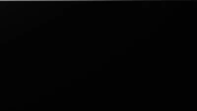 Almost entirely black, with only the ghost of a diagonal edge crossing the middle — close to true #000000 and easy on an AMOLED panel.